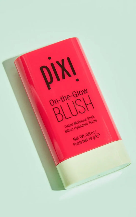 Pixi On-the-Glow Blush on a light green background