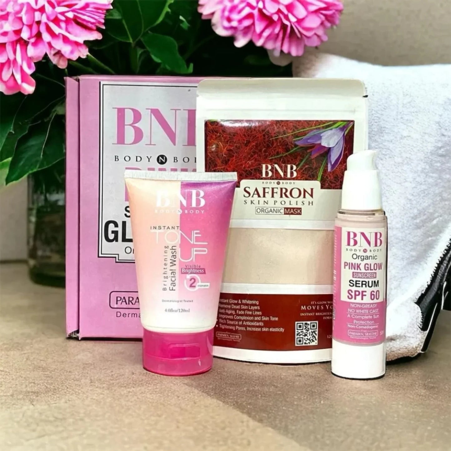 BNB Body N Body skincare set with Brightening Facial Wash, Saffron Skin Polish mask, and Pink Glow SPF 60 serum